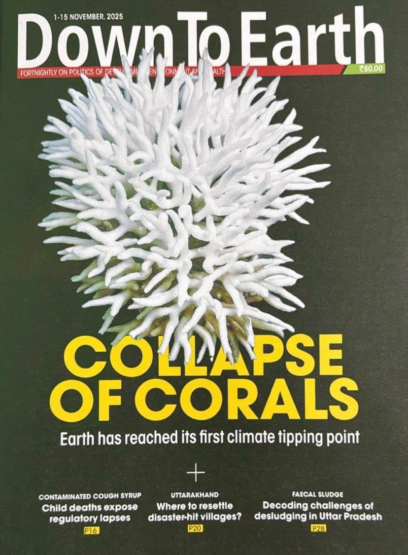 The cover of the "Down to Earth" magazine for November 1-15, 2025, showing a stark image of bleached white coral with the headline "Collapse of Corals